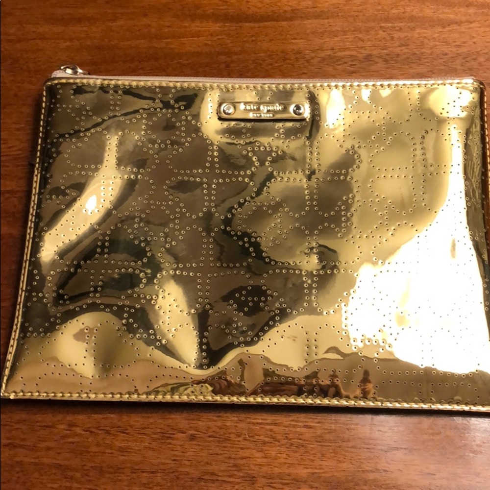 Kate Spade Pierced heart clutch